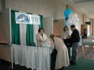 Assisting Attendees at the Booth
